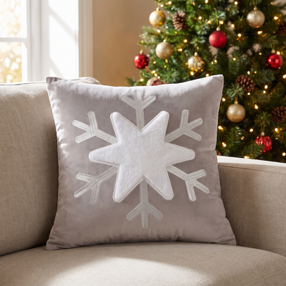 Snowflake Holiday Cushion Cover – Festive Print – styled on a sofa