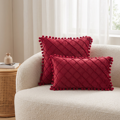 Quilted Luxe Cushion Cover with Pom Pom Trim – styled on a sofa