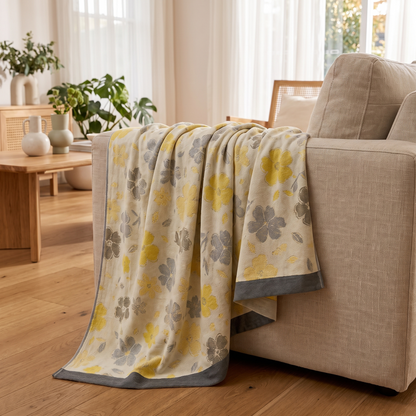 Maple Leaf Bamboo Cooling Blanket – draped over a sofa