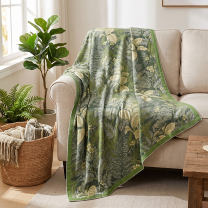 Leaf Print Bamboo Cooling Blanket – draped over a sofa