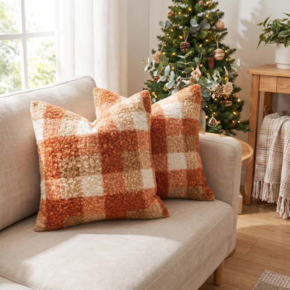 Plaid Boucle Cushion Cover – Orange – styled on a sofa