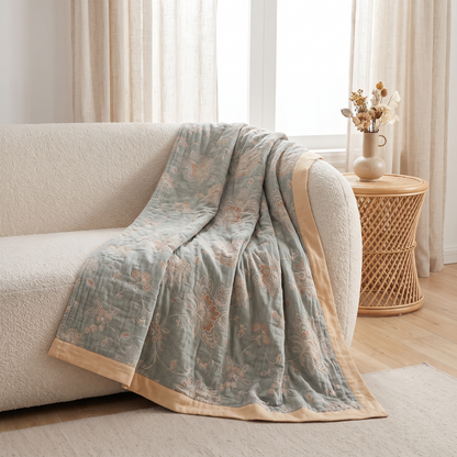 Floral Dream Cotton Throw Blanket – draped over a sofa