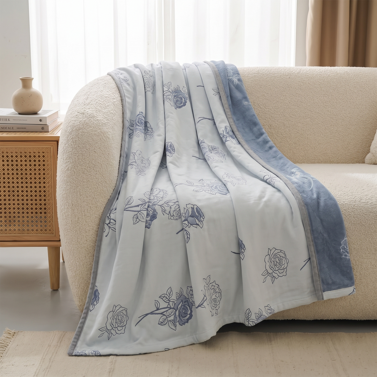 Serenity Rose Cotton Throw Blanket – draped over a sofa