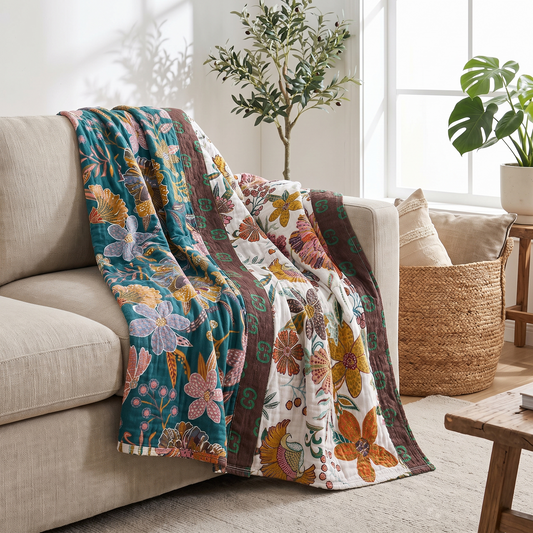 Charm Floral Cotton Throw Blanket – draped over a sofa