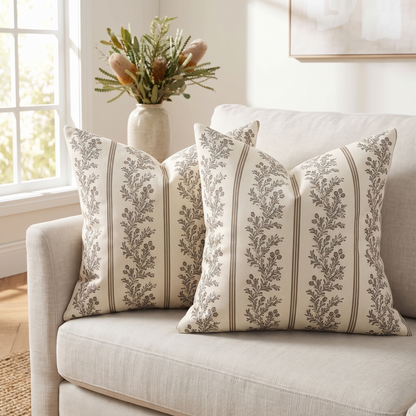 Vintage Striped Botanical Cushion Cover – Chocolate – styled on a sofa