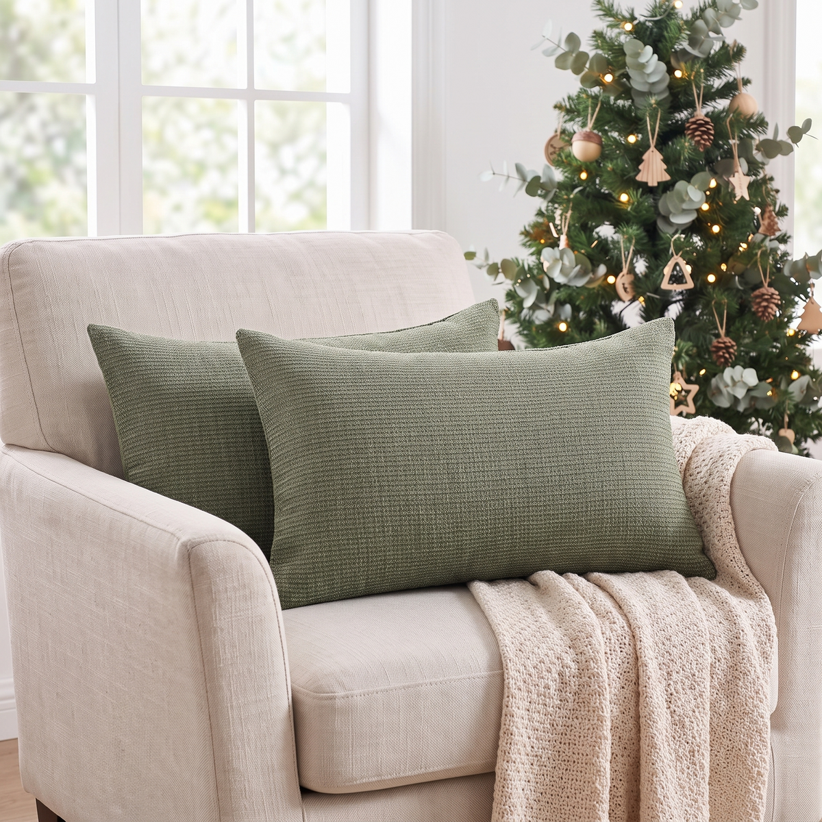 Linen Christmas Lumbar Cushion Cover – Grey Green – styled on an armchair