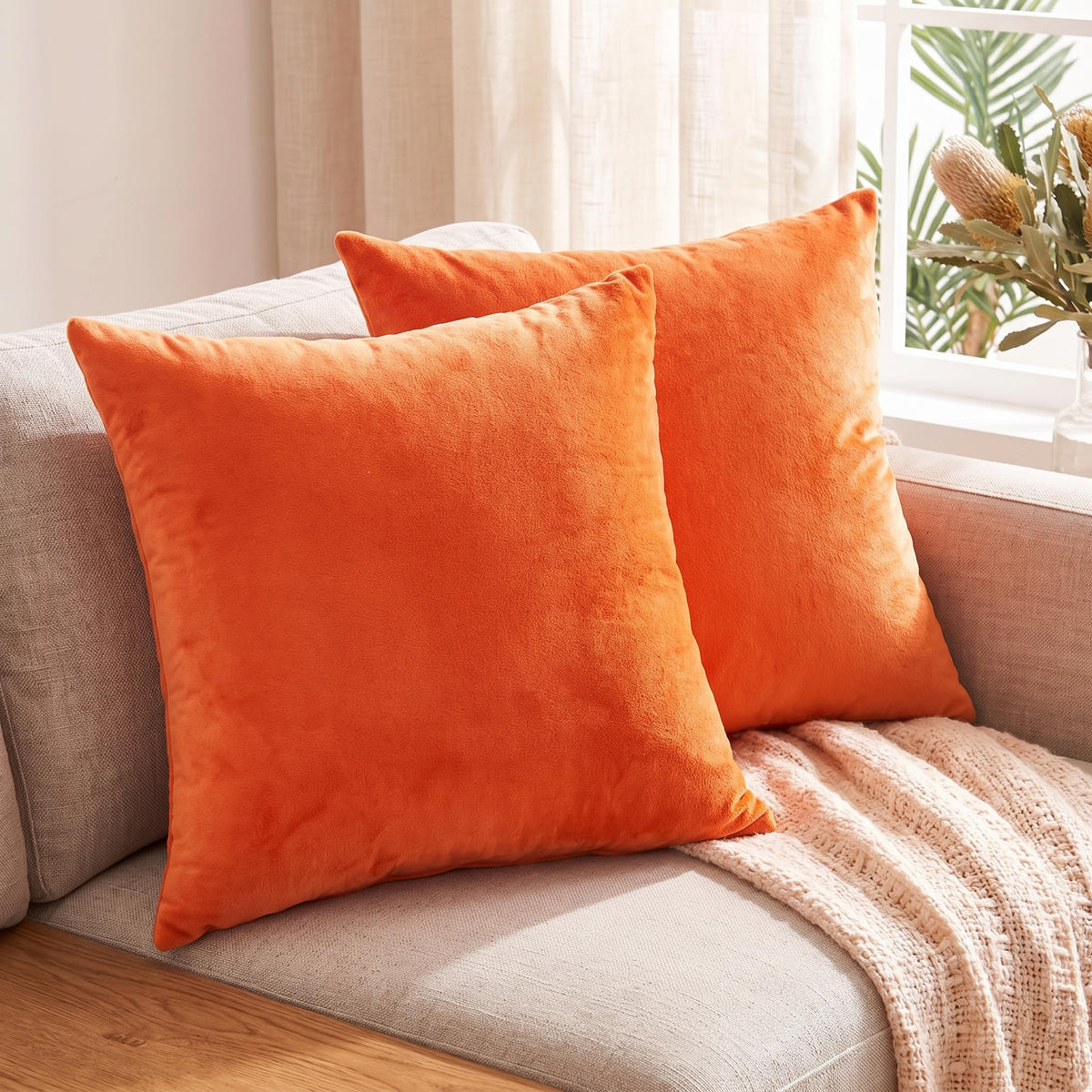 Luxe Velvet Cushion Cover – Burnt Orange – styled on a sofa