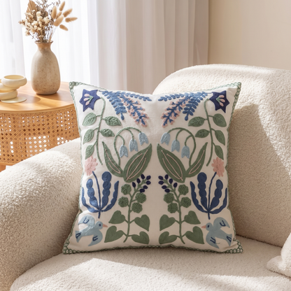 Vintage Botanical Embroidered Cushion Cover – styled on a sofa