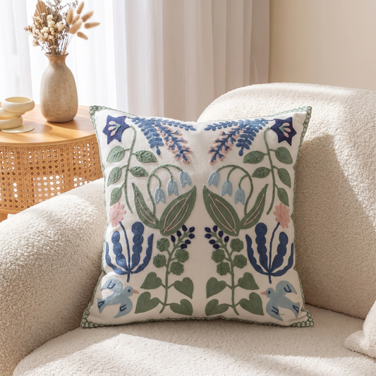 Vintage Botanical Embroidered Cushion Cover – styled on a sofa