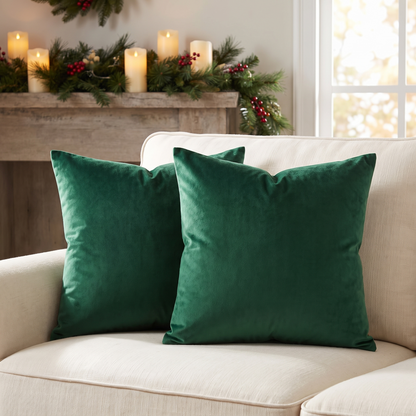 Luxe Velvet Christmas Cushion Cover – Emerald Green – styled on a sofa
