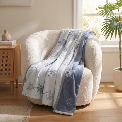 Serenity Rose Cotton Throw Blanket – draped over an armchair