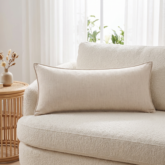 Long Linen Lumbar Cushion Cover – Natural Beige – styled on a sofa