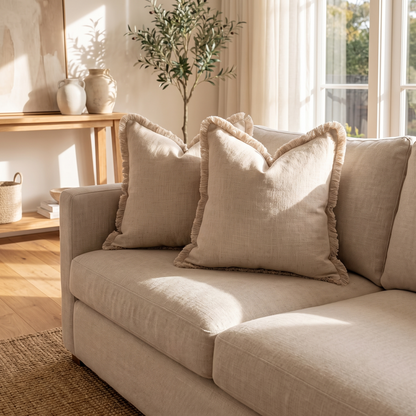 Linen Tassel Cushion Cover – Beige – styled on a sofa