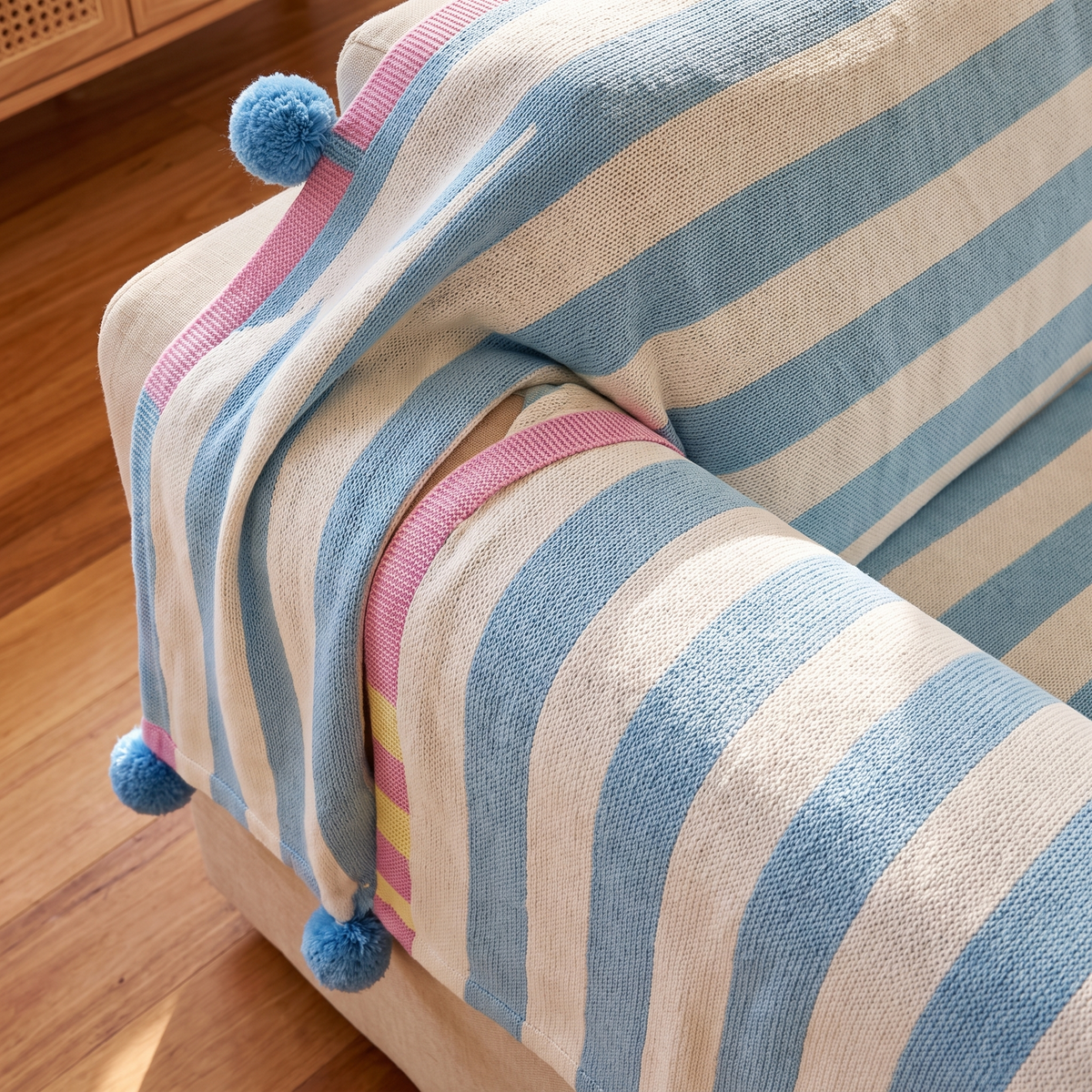 Pastel Striped Couch Cover – Atelier – tucked edge detail