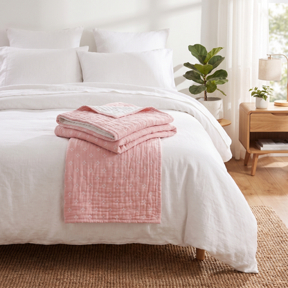 Diamond Dot Cotton Throw Blanket – folded on a bed